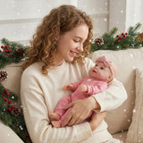 10 inch baby girl in in a women arms