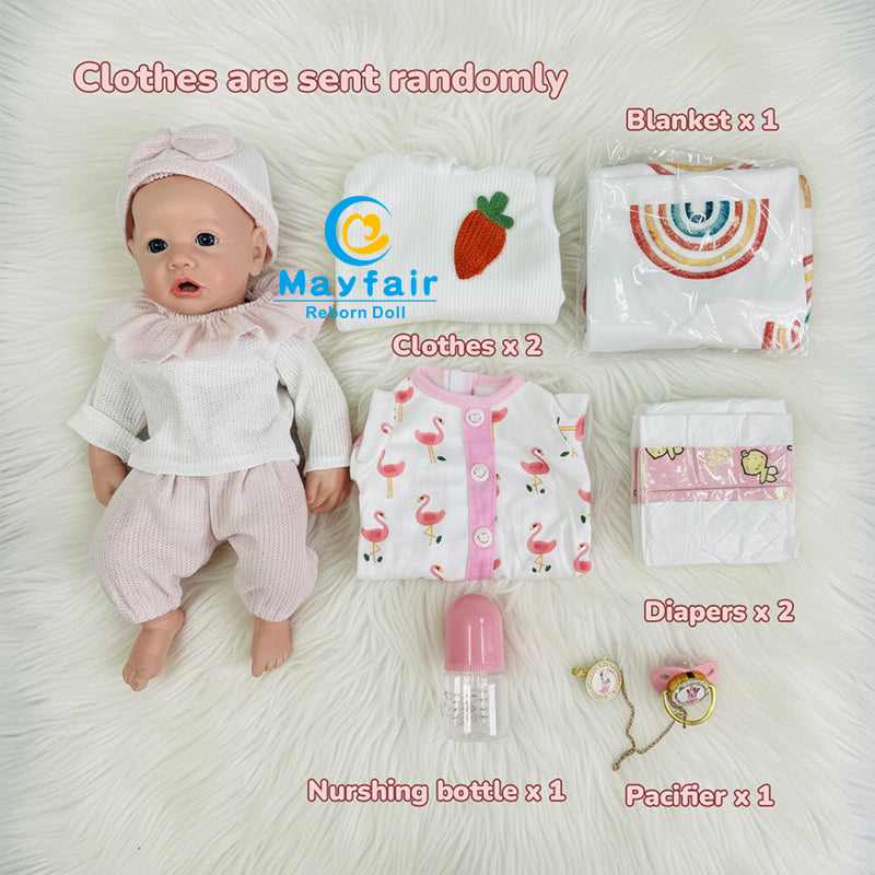 the silicone baby doll with come with clothes and diapers and other accessories