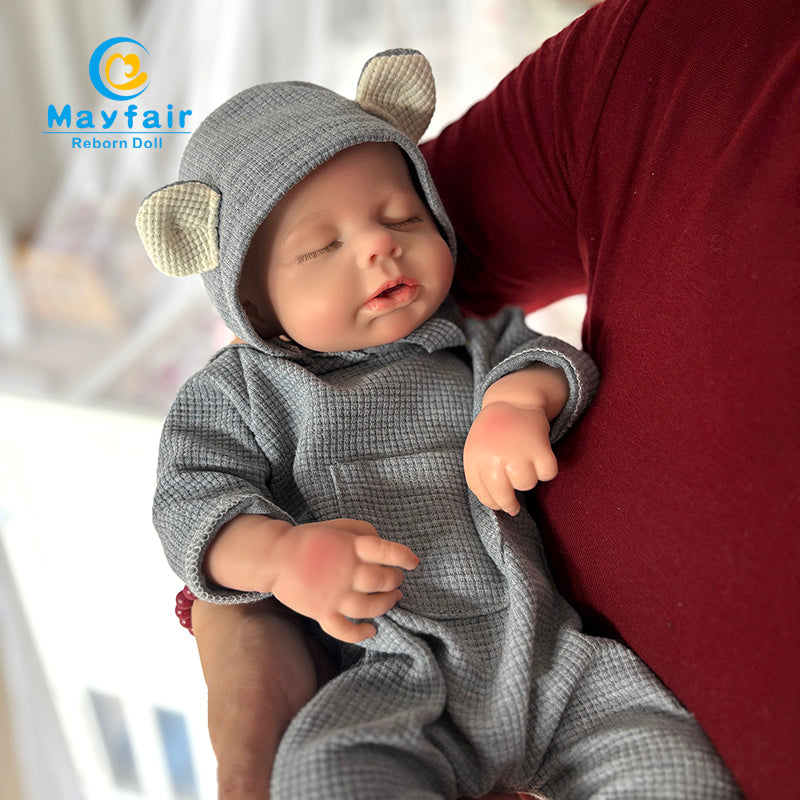 addorable 18 inch silicone baby doll in the arms