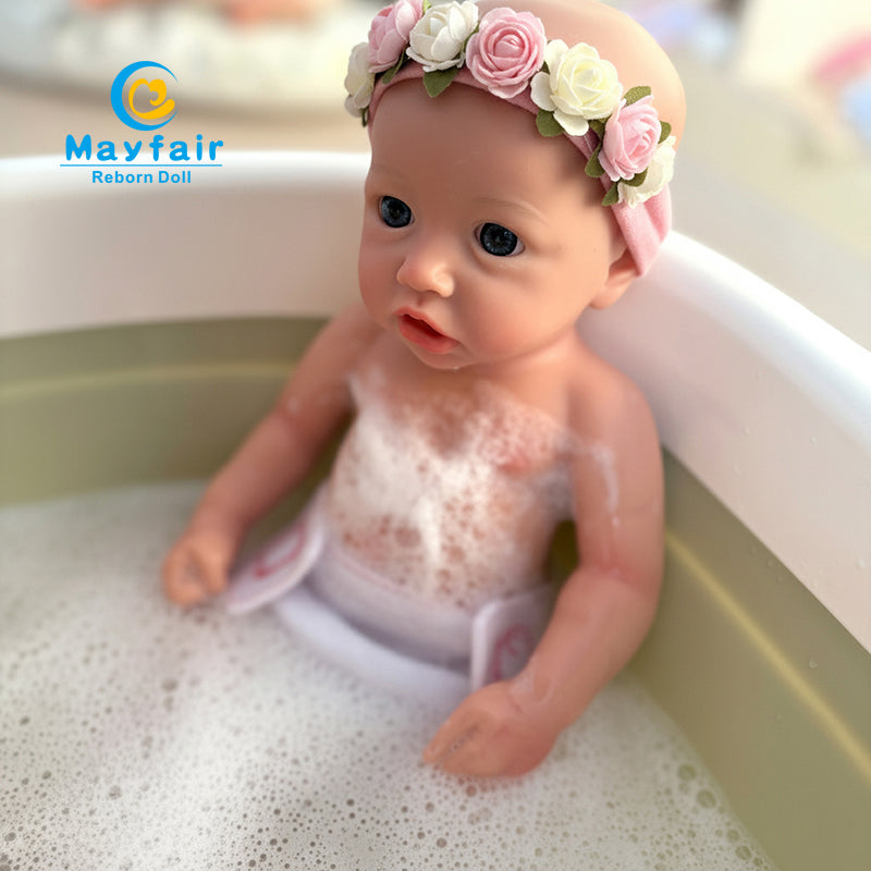 bathable silicone baby doll is bathing