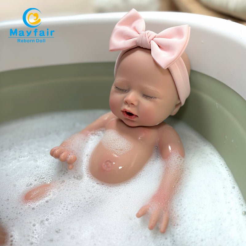 bathable 13 inch silione baby doll is bathing
