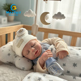 the silicone reborn newborn baby doll is sleeping