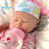 13 inch drink and wet full silicone baby doll is drinking