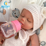 18 inch slicone baby doll is drinking